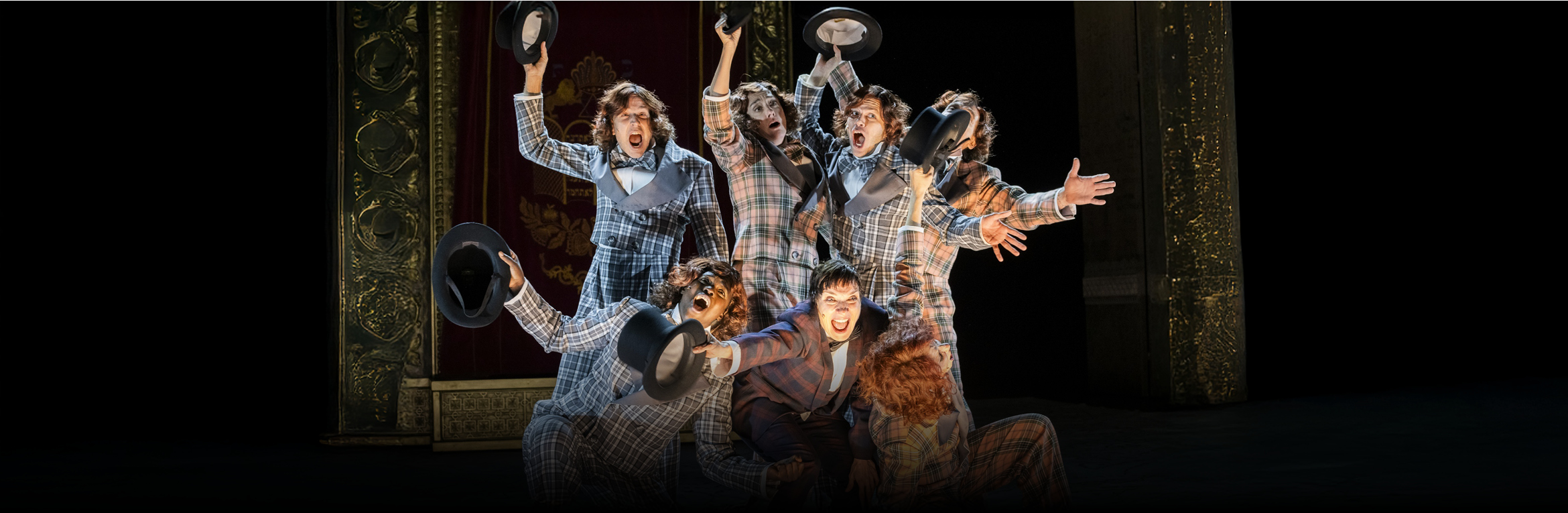 K.